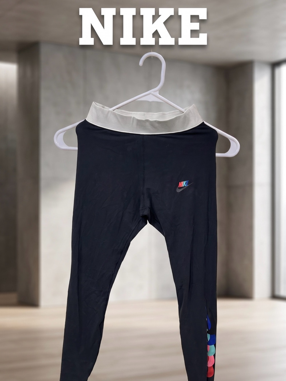 Nike Black Leggings with White Waistband and Multicolor Dot Accent